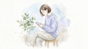 スマートフォンを見下ろす姿勢のイメージ（水彩イラスト）